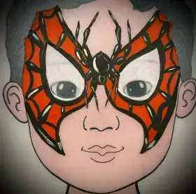 Red webbed superhero face painting mask with black and white eye details.