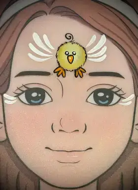 Yellow chick face painting design for spring celebrations and school events.