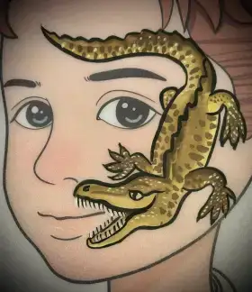 Crocodile cheek face painting design with gold accents and a toothy grin.