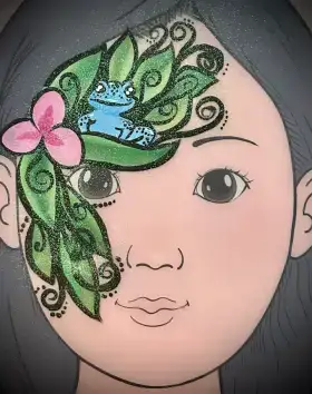 Blue frog face painting design beside the eye with playful details.