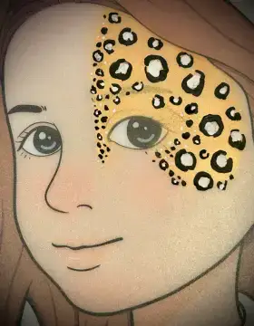Leopard spot face painting design around the eye with gold and black details.