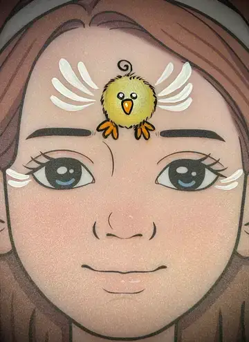 Yellow chick face painting design for spring celebrations and school events.