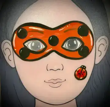 Ladybug face painting mask for a kids birthday party or school event.