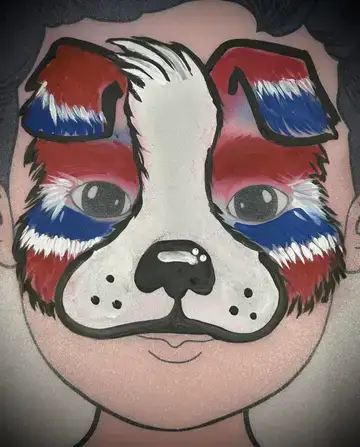 Puppy face painting design for animal-themed birthday parties and kids events.